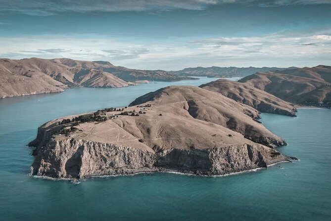 Explore Godley Head, Lyttelton & Christchurch (Small Group Tour) - Stop 2: Sumner Beach and Cave Rock