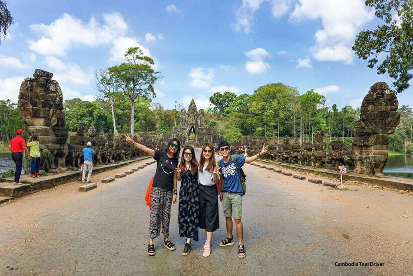 From Phnom Penh: Angkor Wat, Bayon, and Ta Prohm Day Trip - Exploring the Bayon Temple: The Smiling Faces
