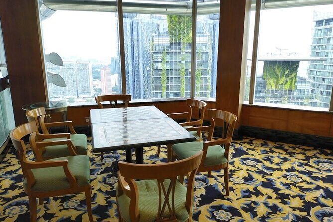 Petronas Twin Tower Skybridge View & Dining Experience Tour with Local Host - Authentic Experiences and Review Highlights
