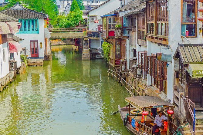 Private Day Tour: Zhujiajiao Water Town with Shanghai Local Shopping Outing - Shopping and Markets: From souvenirs to textiles