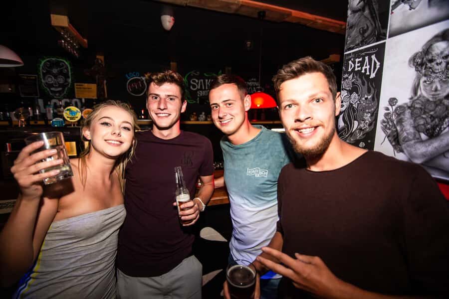 Queenstown: Bar Crawl with 5 Free Shots and Pizza - Who Should Consider This Tour?