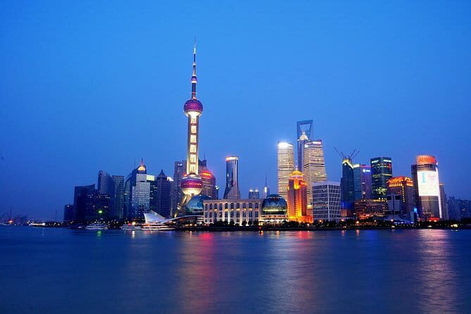 Shanghai by Night with Fine Local Dinner and VIP River Cruise Experiences - Authentic Experiences Highlighted by Travelers
