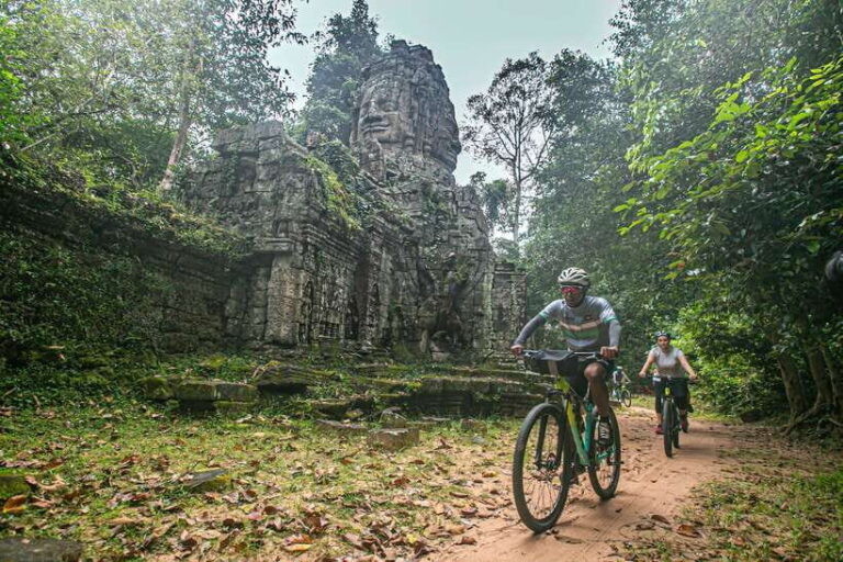 Siem Reap: Angkor Sunrise 2 Days Guided Bike Tour - Day 1: Witnessing the Sunrise at Angkor Wat