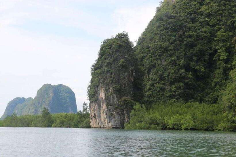 Khaolak: Phang Nga Bay, Tapu Island, and Panyi Village Tour - Visiting James Bond Island: A Movie Legend