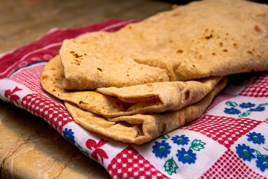 Traditional Arabic flatbread being baked at local bakery