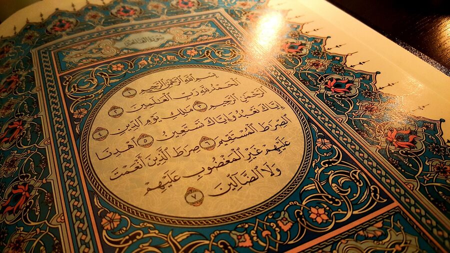 Arabic calligraphy art with ornate design patterns