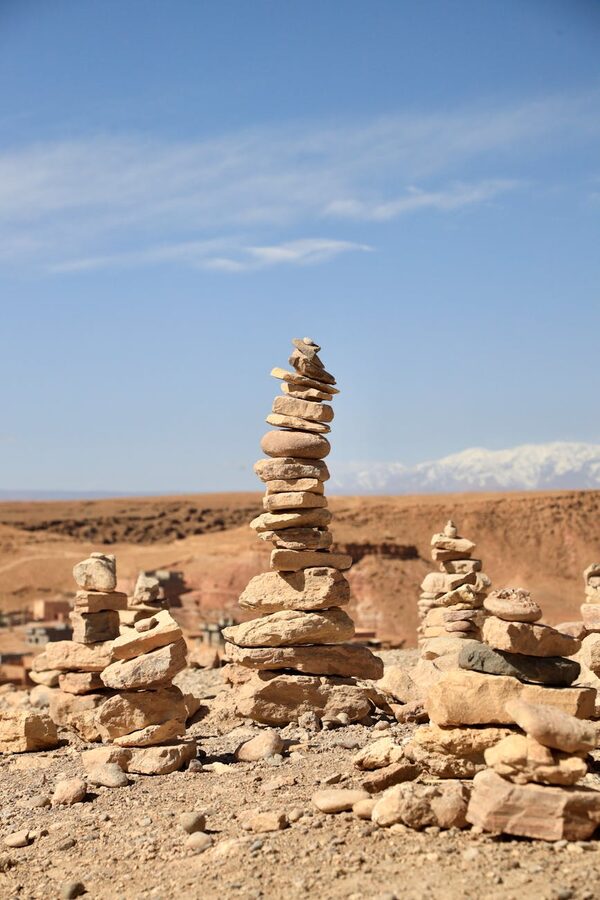 Stacked stone cairns in arid desert