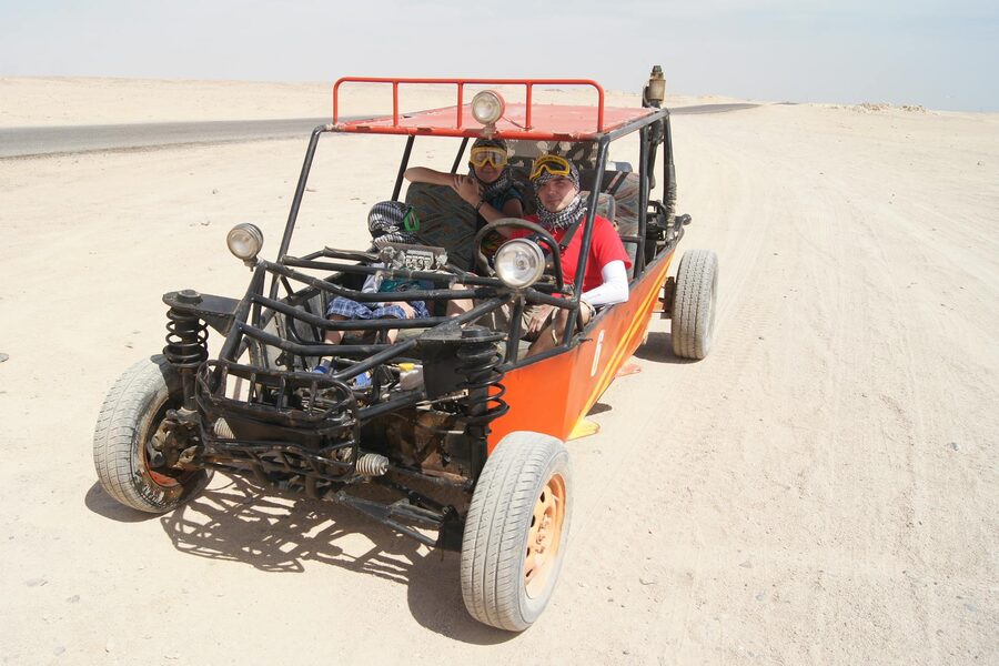 Open buggy ride in desert