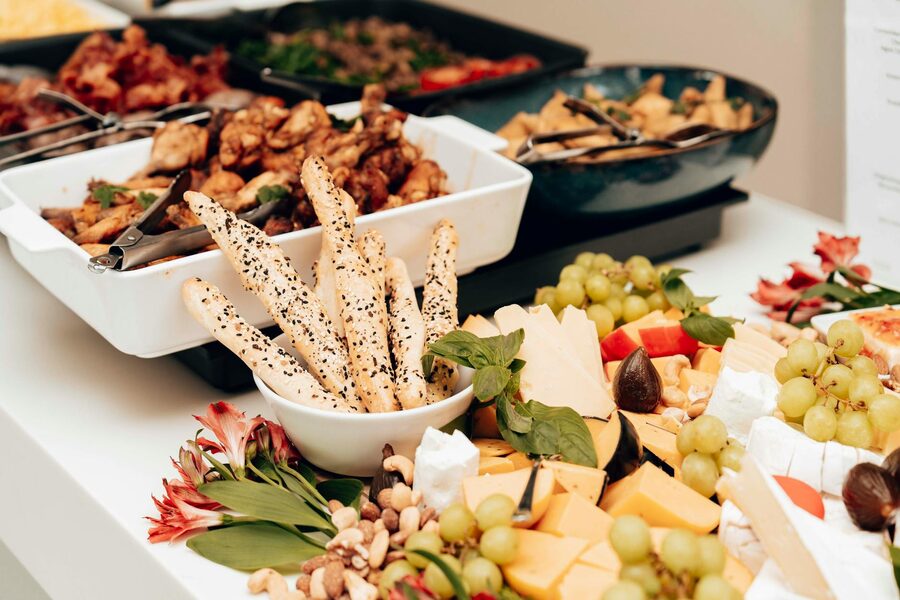 Buffet table with assorted dishes on a dinner cruise