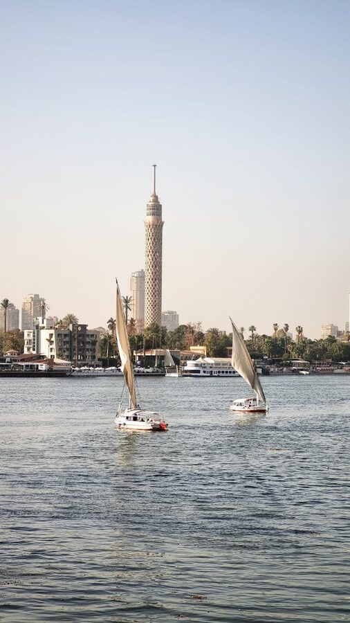 Sailboats on the Nile with Cairo Tower in background
