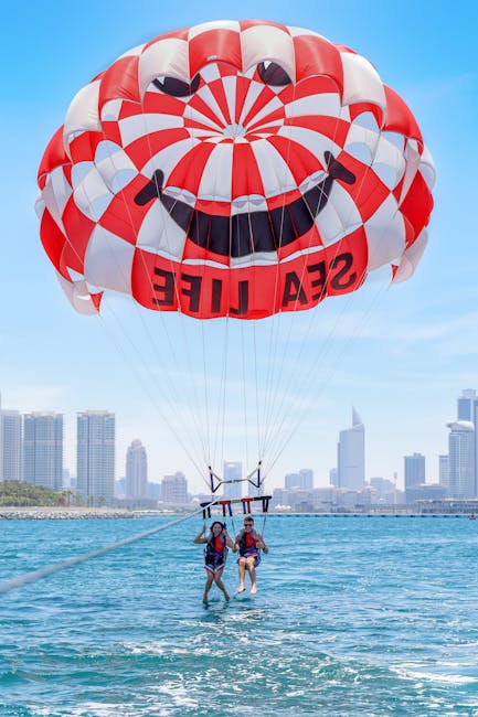 couple parasailing dubai skyline pexels