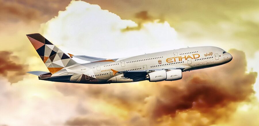 Airplane with Dubai skyline in background