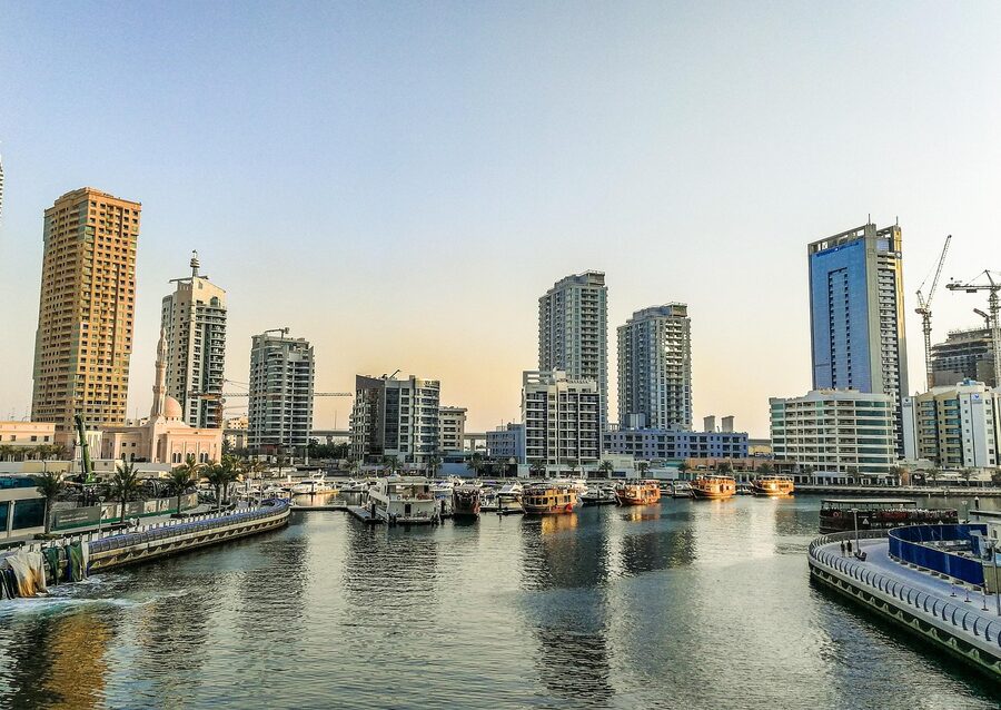Dubai Water Canal at night with illuminated buildings