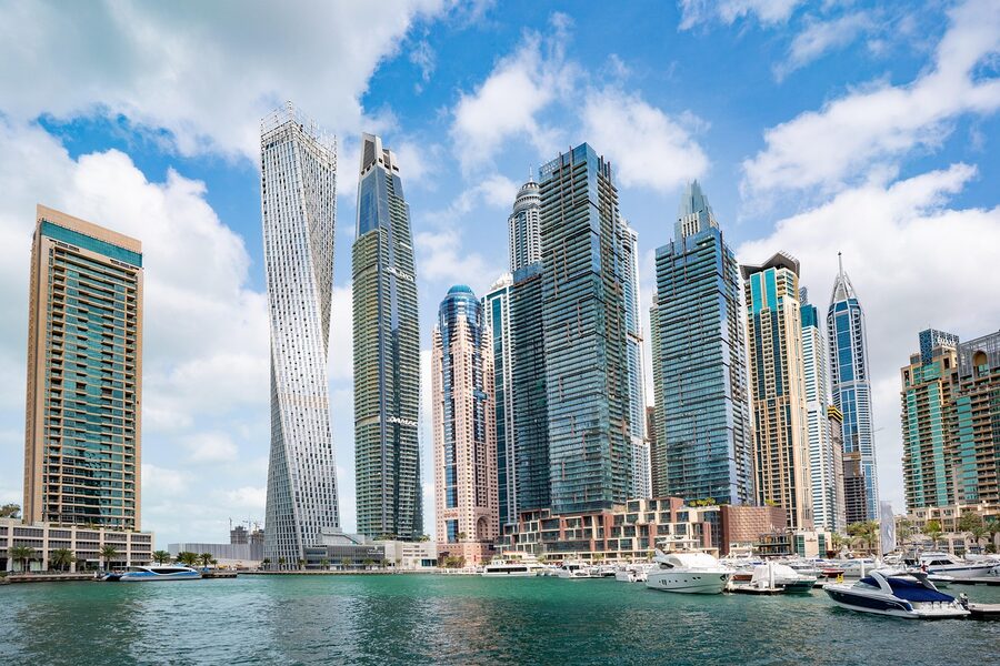Dubai Marina waterfront with boats and modern buildings