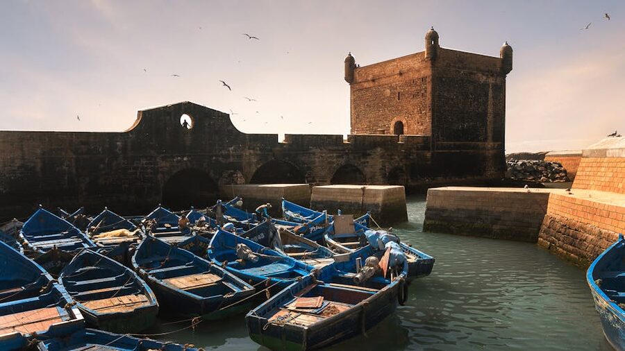 Essaouira blue boats under fort