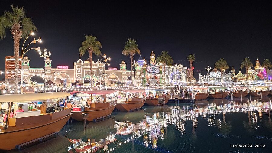 Global Village Dubai illuminated streets after dark