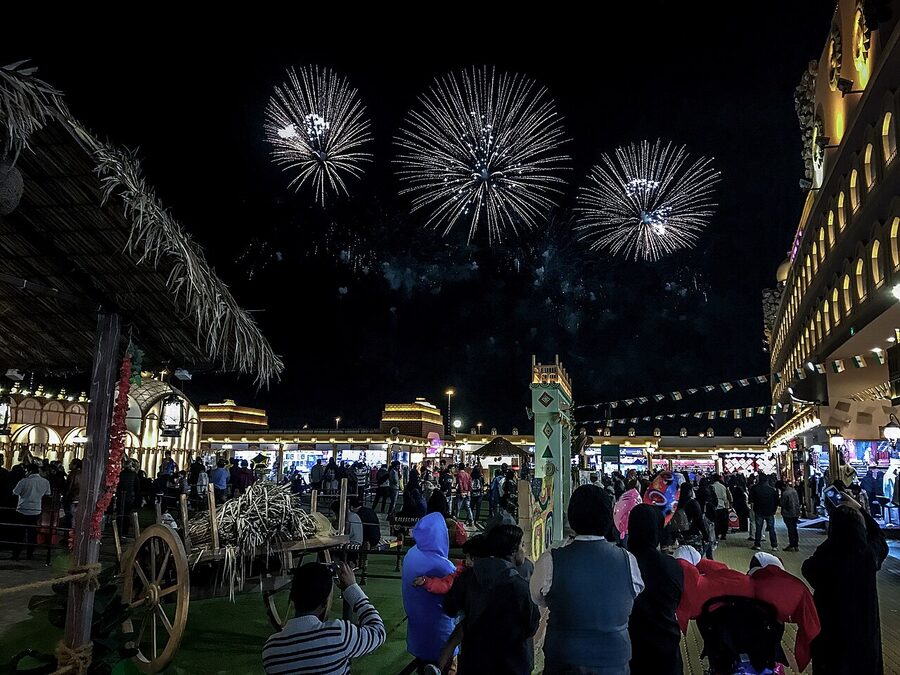 Global Village Dubai rides illuminated at night