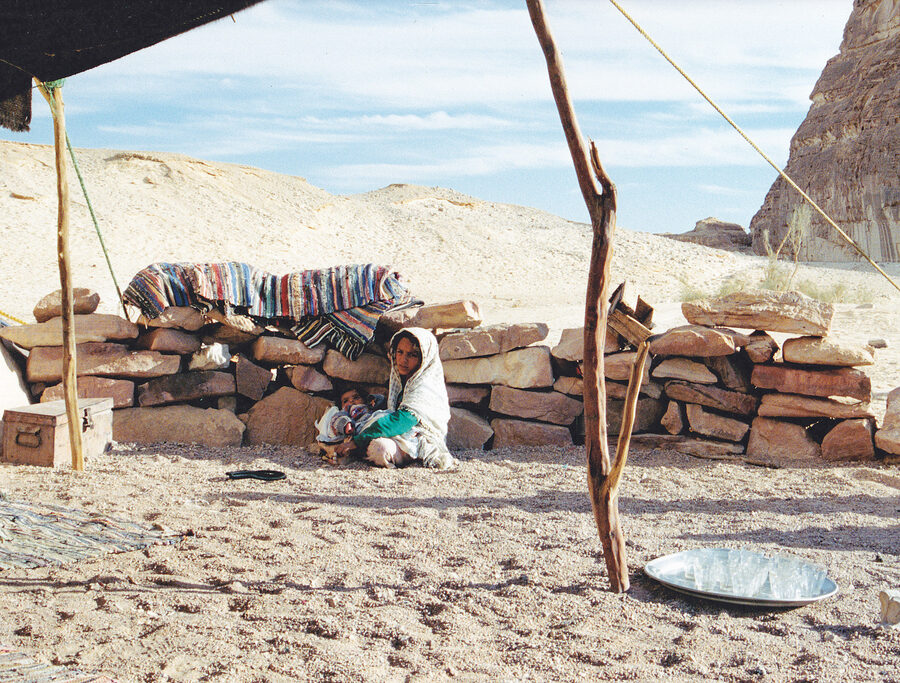 Bedouin children outside a tent in the Egyptian desert
