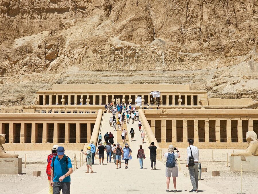 Visitors walking up to Hatshepsut Temple in Luxor
