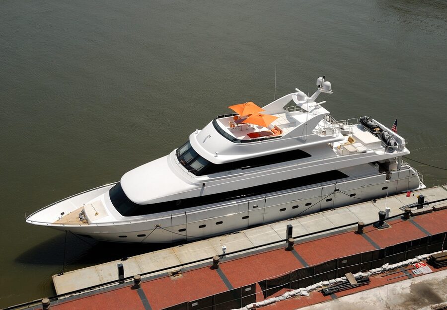 Luxury white boat deck with clean lines and ocean views