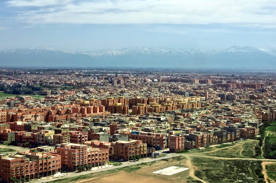 Marrakech aerial view with Atlas Mountains