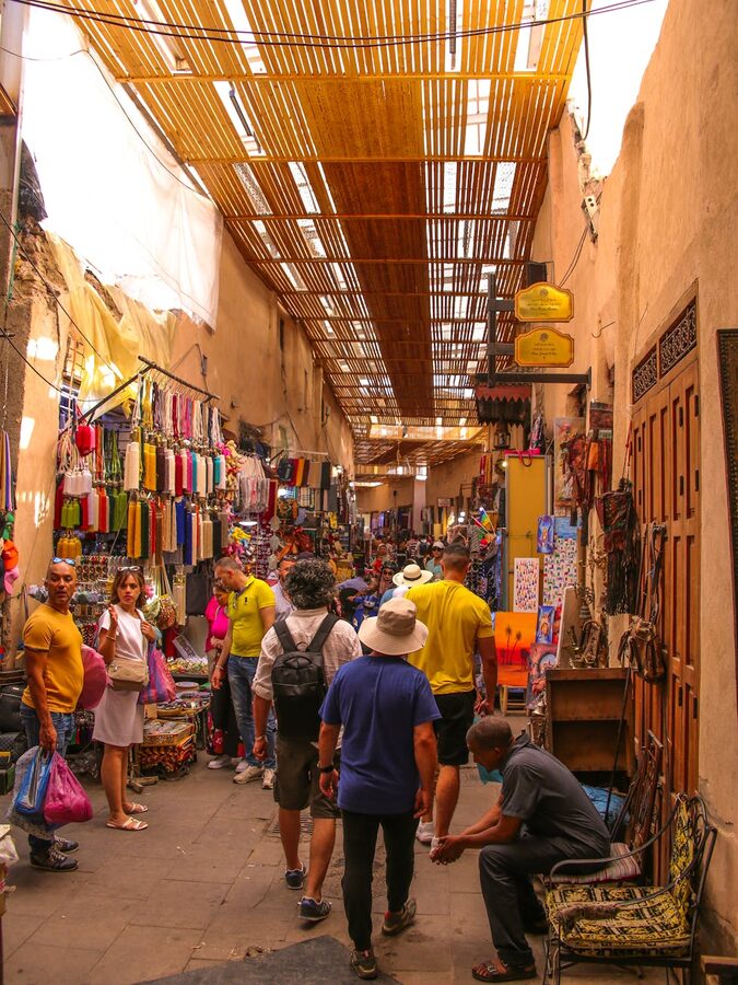 Street in Marrakech medina with shops