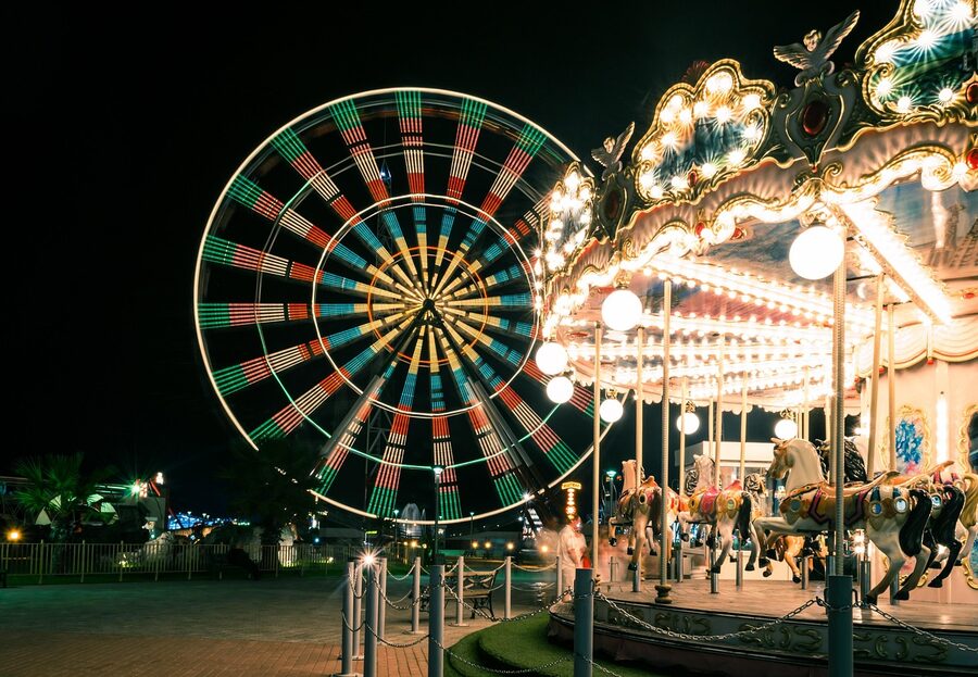 Amusement park ride illuminated at night