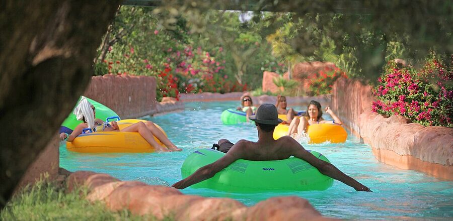 Rio Tranquille lazy river at Oasiria Water Park Marrakech with wooden bridges