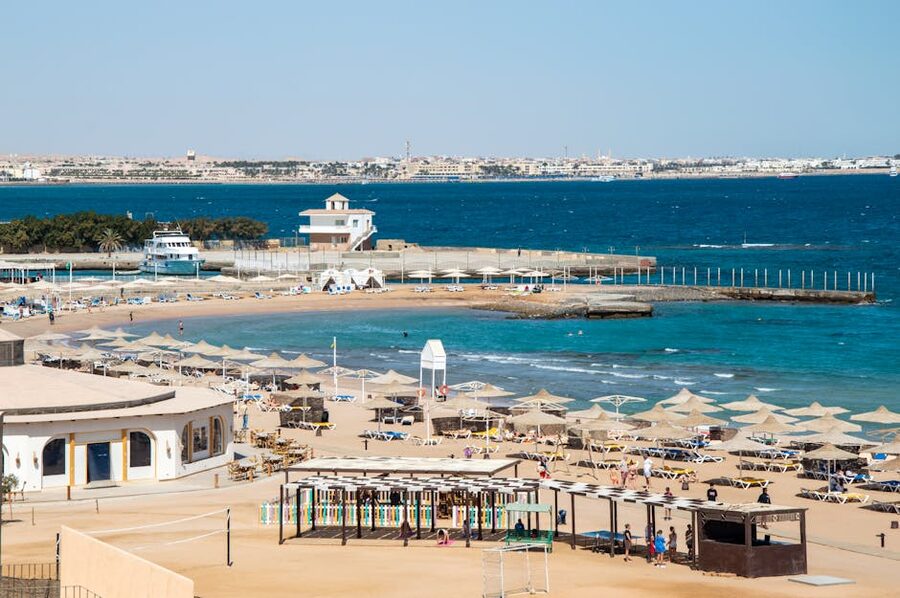 Aerial view of Hurghada beach resort with long jetty stretching into Red Sea