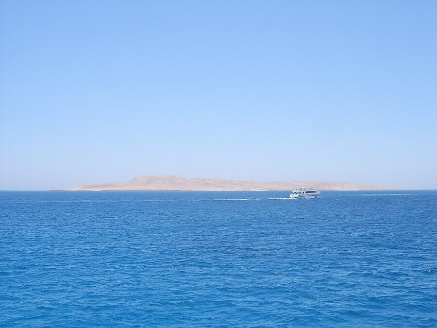 Aerial view of Giftun Island coastline with coral reef structures visible through clear Red Sea water