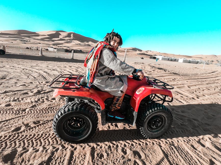 ATV across sandy landscape