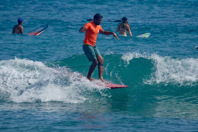 Surfing lesson at beautiful beach Playa Encuentro - What to Expect During Your Surfing Lesson