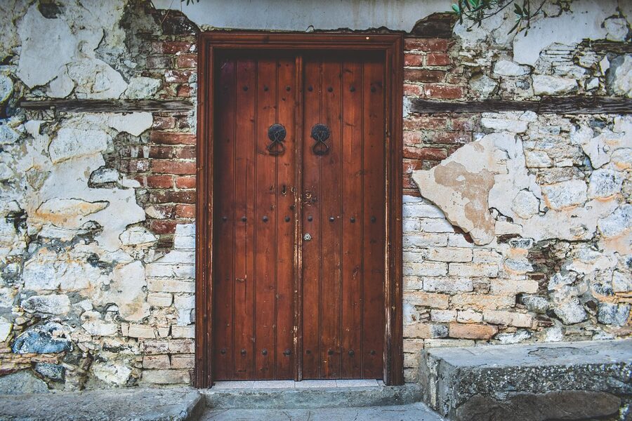 Traditional wooden carved door in old building