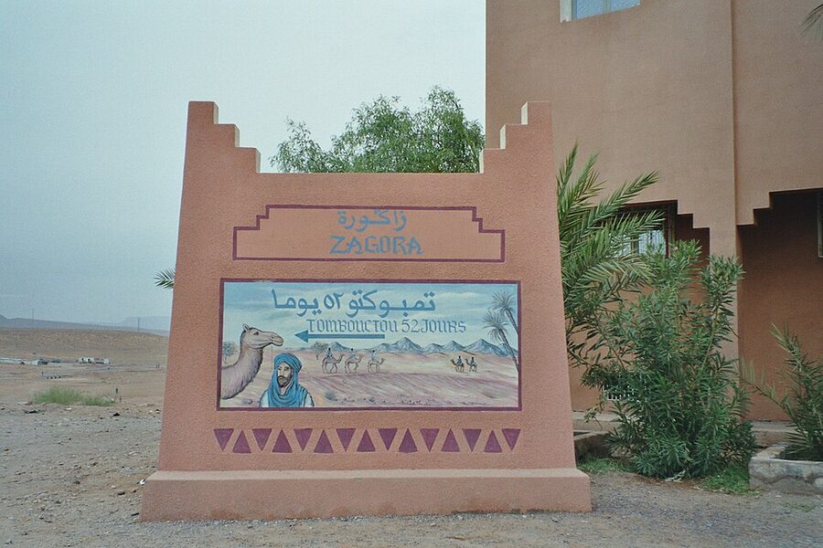 Timbuktu 52 Days camel sign at edge of Zagora Morocco