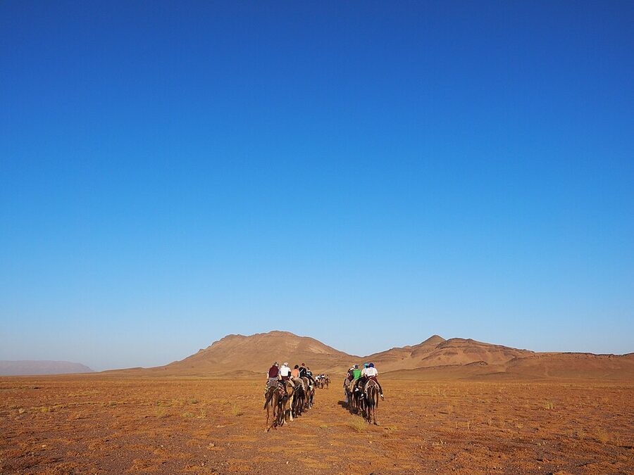 Tourists on a desert trek in the Zagora dunes