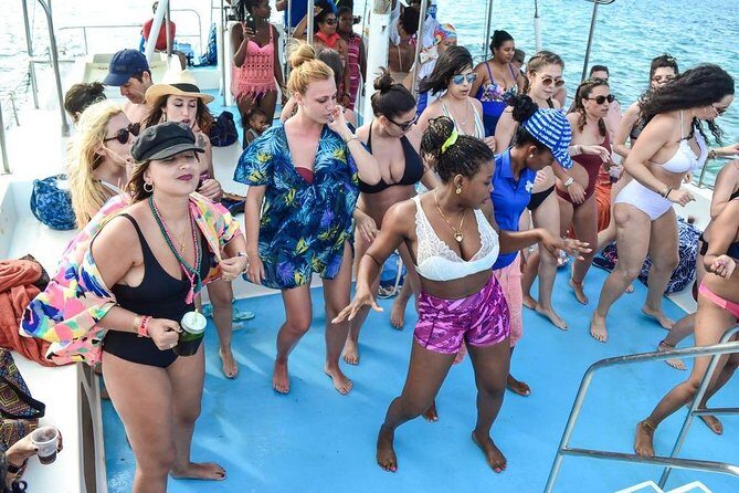 Party boat in Catamaran with Open Bar Only Adults + Snorkeling - An Overview of the Experience