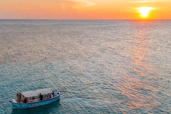 Sunset Boat Trip in the Spanish water and coastline of Curacao - The Sum Up